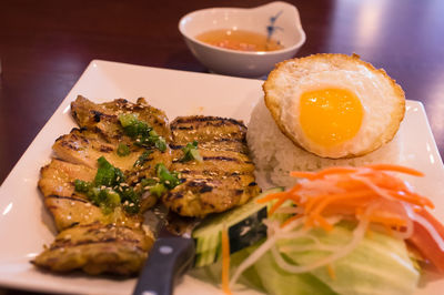 Close-up of breakfast served on table