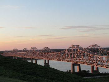 Mississippi bridge against sky during sunset