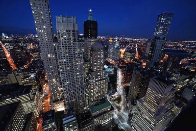 Low angle view of illuminated city at night