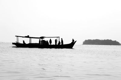 People on boat in sea