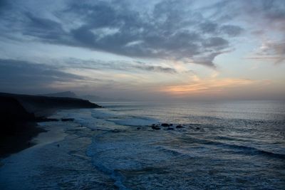 Scenic view of sea against sky during sunset