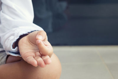 Cropped image of girl meditating