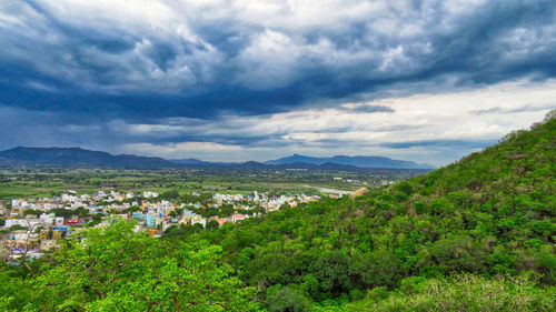 Aerial view of townscape against sky