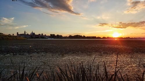 Scenic view of sunset over river