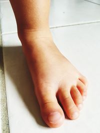 Low section of baby feet