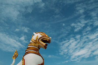 Low angle view of statue against sky