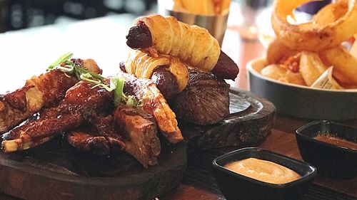 Close-up of food served on table