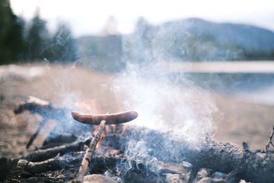 Close-up of bonfire on mountain