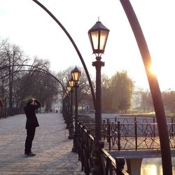 People standing on railing