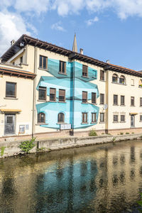 The historic center of omegna with beautiful buildings near the river