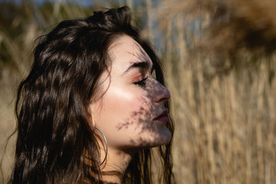 Close-up portrait of young woman