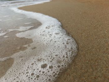 High angle view of bubbles on beach