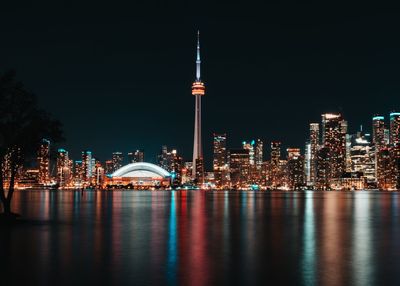 Illuminated buildings in city at night