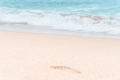 Close-up of waves on beach