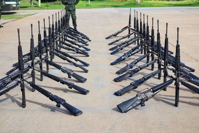 Row of metal fence on field