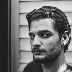 Portrait of young man looking away