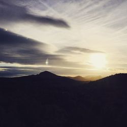 Scenic view of landscape against sky during sunset