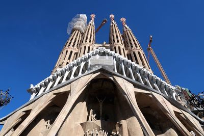 Low angle view of cathedral against clear blue sky