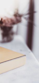 Close-up of yellow pencil on table