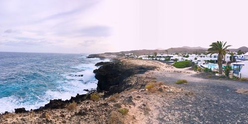 Scenic view of beach against sky