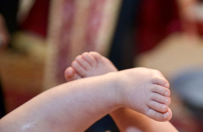 Low section of baby feet