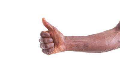 Close-up of human hand against white background