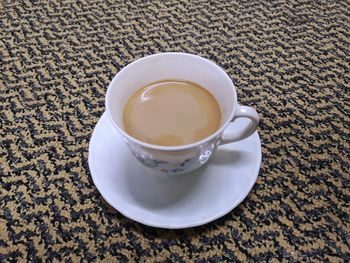 High angle view of coffee on table