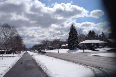 Road against cloudy sky