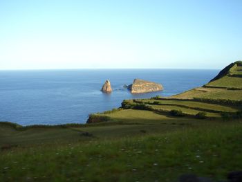 Scenic view of sea against clear sky