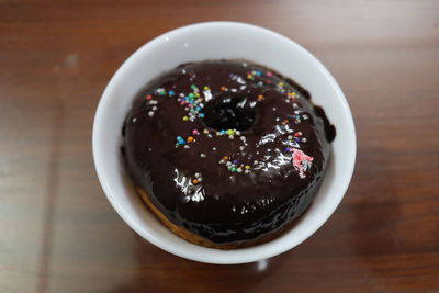 High angle view of chocolate cake in plate on table