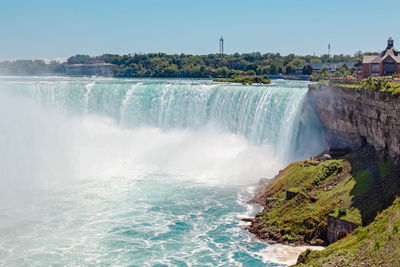 Aerial top landscape view of niagara falls between united states of america and canada. 