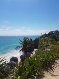 Scenic view of sea against clear blue sky