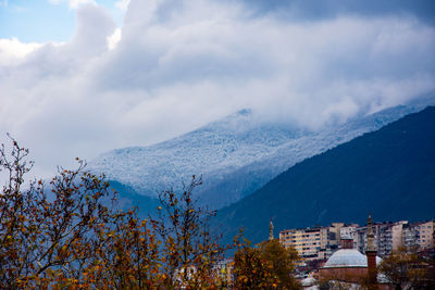 Scenic view of mountains against sky during winter