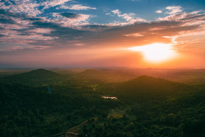 Scenic view of mountains against sky during sunset