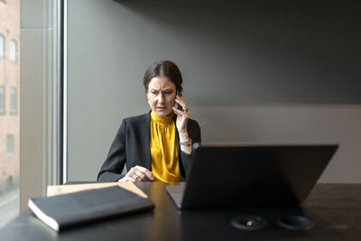 Businesswoman on the phone in office