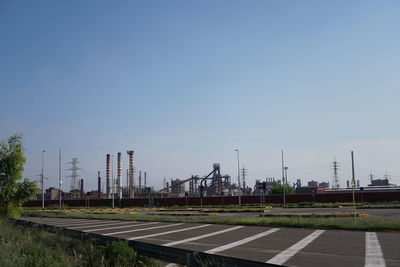 Empty road against clear sky