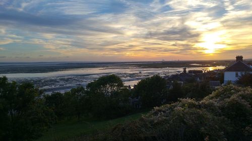 Scenic view of sea at sunset