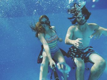 Couple in swimming pool