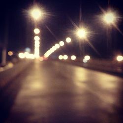 Illuminated street lights at night