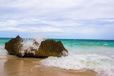 Waves breaking on beach