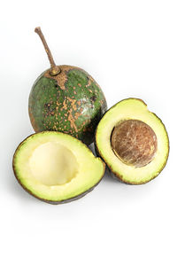 Close-up of fruits against white background