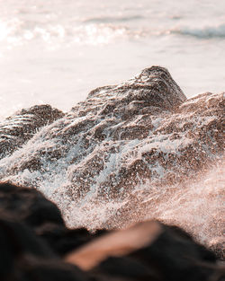Close-up of water flowing through rocks