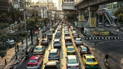 High angle view of cars on road in city