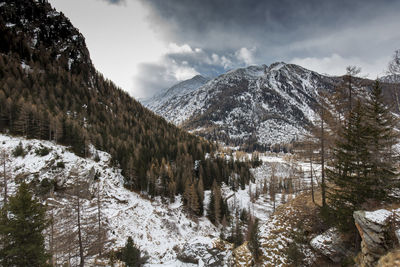 Scenic view of mountains against sky during winter