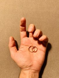 Close-up of couple holding hands