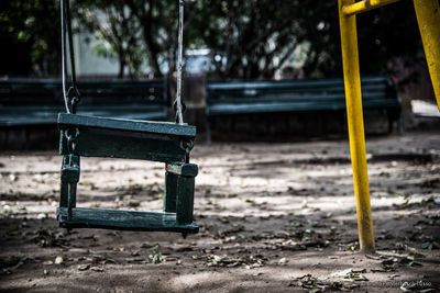 Empty swing in playground