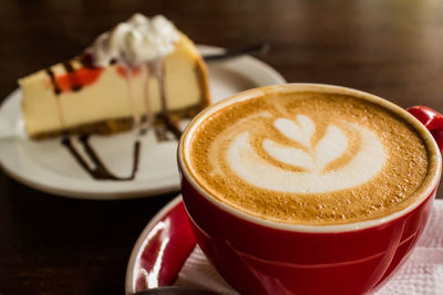 Close-up of cappuccino on table