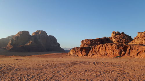 View of desert against blue sky