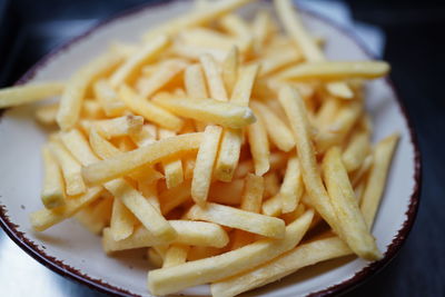 Close-up of pasta with fries
