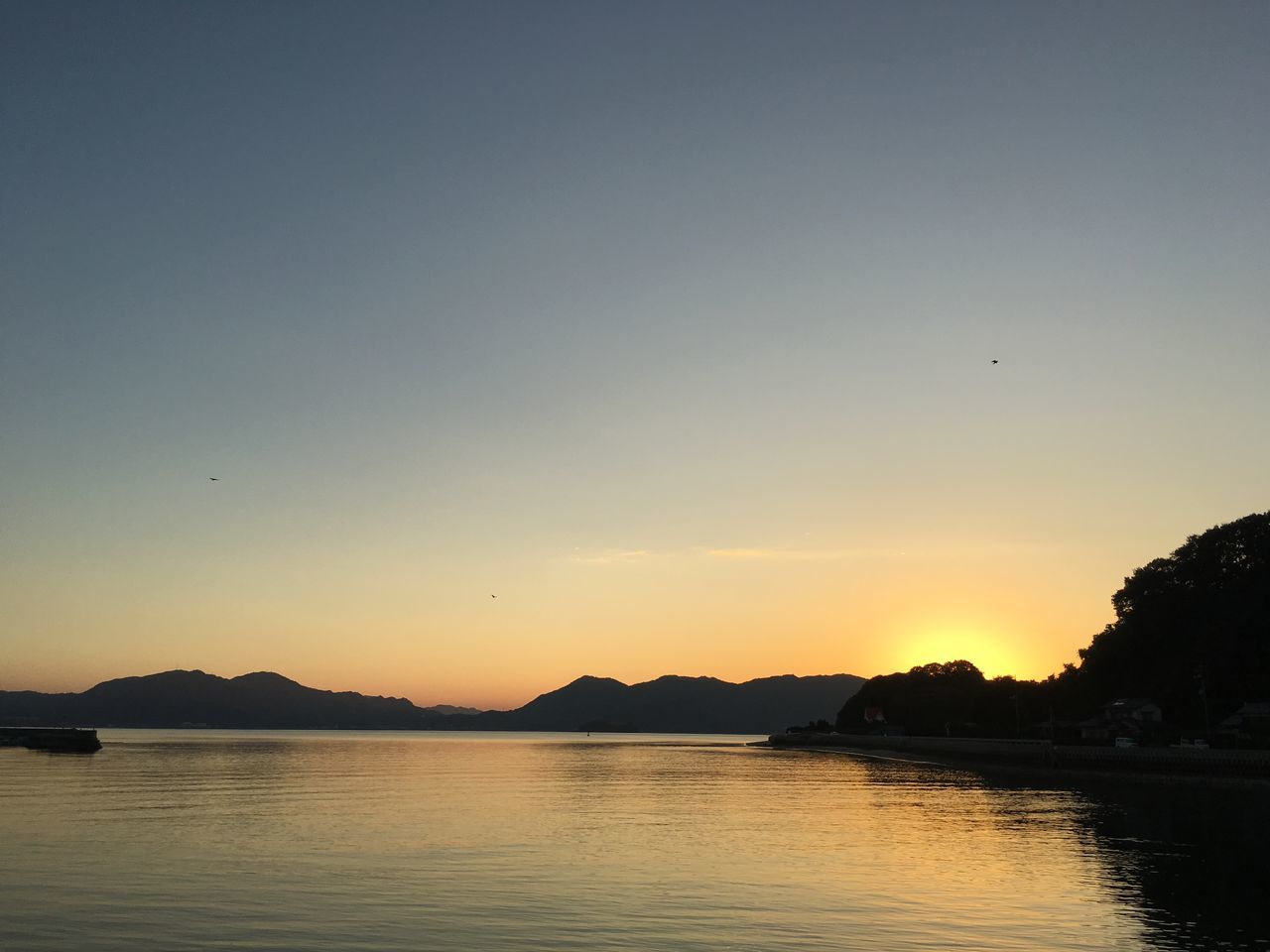 water, sunset, tranquility, tranquil scene, sky, scenics, beauty in nature, reflection, nature, cloud - sky, sea, idyllic, lake, waterfront, silhouette, cloud, horizon over water, outdoors, no people, calm